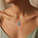 18ct White Gold Natural Diamond And Blue Topaz Pendant
