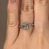 "Arianna" Oval Cut Diamond Shoulders Engagement Ring Life Style- Top View