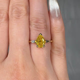 "Avenqor" Yellow 1.52 Carat Pear Cut Trilogy Lab Grown Diamond Engagement Ring HLM520 HEERA DIAMONDS