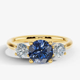 "Bluzz" Round Cut 1.5 Carat Blue Sapphire Trilogy Yellow Gold Engagement Ring 3SRB51 HEERA DIAMONDS