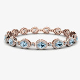 Halo Pear Shape 9 Carat Diamond and Aquamarine Bracelet BRHAPSA HEERA DIAMONDS
