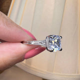 "Hope" Cushion Cut 3 Carat Trilogy Platinum Engagement Ring lifestyle-Top View