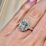 "Lina" Oval Cut 1 carat halo Platinum Engagement Ring Life style- Top view