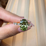 "Lousiana" Oval Cut 2 Carat Fancy Vivid Green Diamond Shoulder 18k Yellow Gold Engagement Ring HEERA DIAMONDS