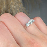 Round-Cut-Trilogy-Engagement-Ring- side view
