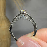 "Noric" 0.58 Carat Round Cut Lab Grown Diamond Shoulder Engagement Ring HLR484