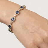 Oval Shape 12 Carat Sapphire Center Featuring Diamond Halo Bracelet BRHAOCS