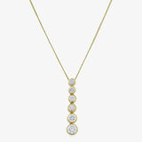 Round cut solitaire diamonds in rub over setting HEERA DIAMONDS