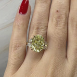 "Lion" Oval Cut 5.5 Carat Lab Grown Trilogy Yellow Gold Engagement Ring