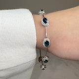 Oval Shape Sapphire Featuring Diamond Halo 18K White Gold Station Set Bracelet