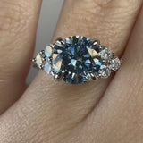 "Kiara" Round Cut Blue Diamond 2.5 Carat Lab Grown Diamond Shoulder Yellow Gold Engagement Ring