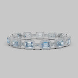 Emerald Shape 11 Carat Aquamarine Tennis Bracelet Featuring Diamond Halo BRHAEC