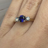 "Bluzz" Round Cut 1.5 Carat Blue Sapphire Trilogy Lab Grown Diamond Yellow Gold Engagement Ring 3SRB51