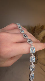 Emerald Shape 11 Carat Aquamarine Tennis Bracelet Featuring Diamond Halo BRHAEC