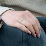 NABILA - Round Brilliant Engagement Ring with Grain Setting Diamond Shoulders in Platinum - HEERA DIAMONDS