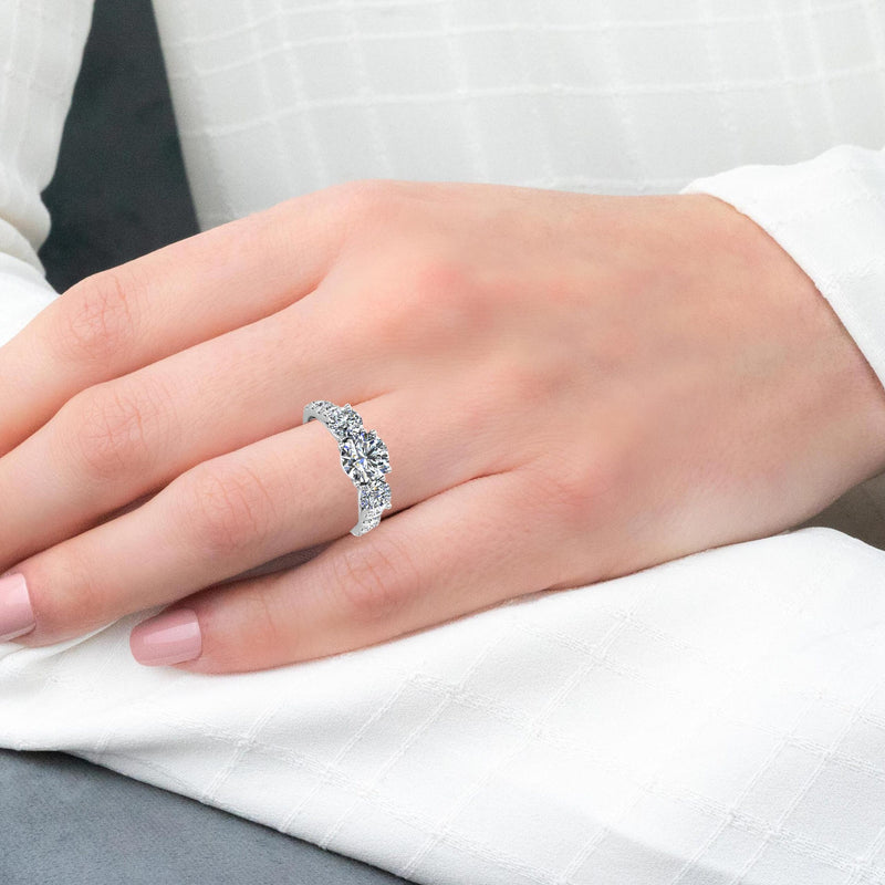 VERDUM - Round Brilliant Trilogy Engagement Ring with Diamond Shoulders in Platinum - HEERA DIAMONDS