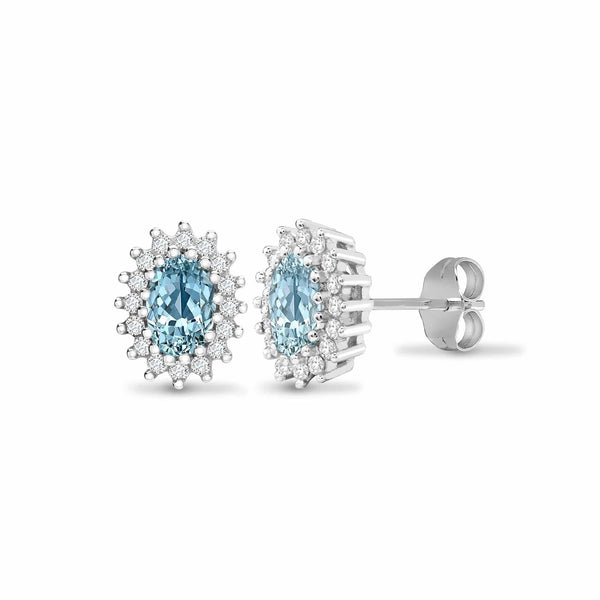 BLUE TOPAZ HALO STUD EARRINGS IN 9K WHITE GOLD - HEERA DIAMONDS