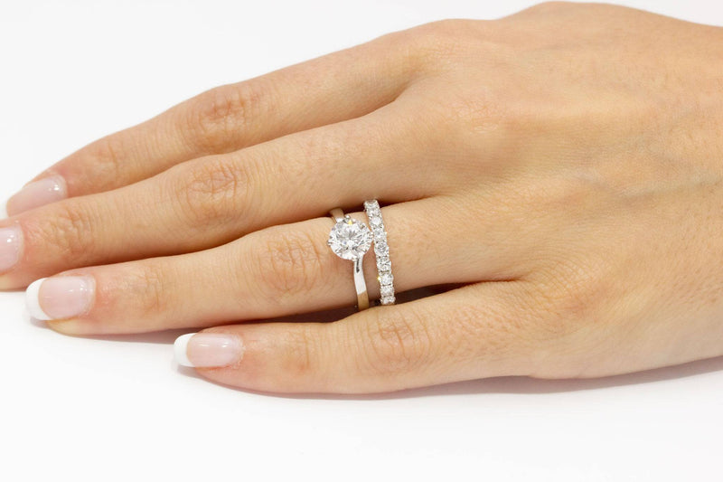Salva Round Brilliant Crossover Solitaire Engagement Ring in Platinum - HEERA DIAMONDS
