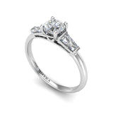HARLEQUIN - Round Brilliant Trilogy Ring with Tapered Baguettes in Platinum - HEERA DIAMONDS